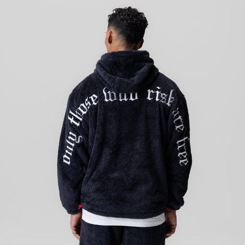 Sherpa Recovery Hoodie in navy with white text, back view on model