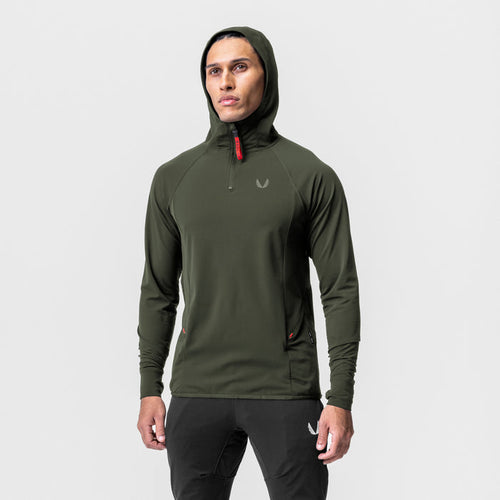 Training Hoodie in olive worn by model, front view with hood up