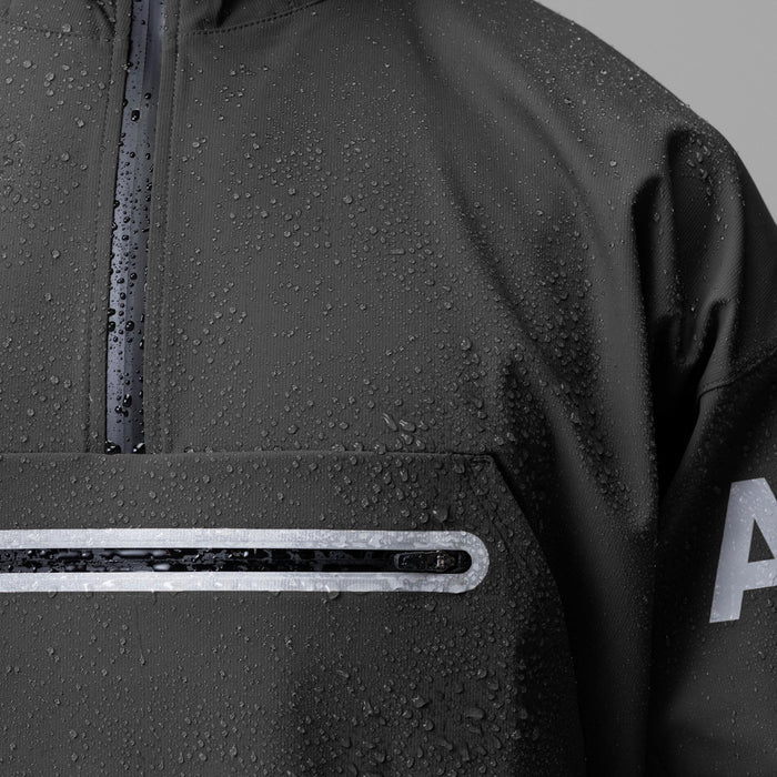Weather-Ready Anorak Jacket in Space Grey, worn with water beads on fabric, detail shot