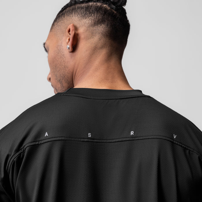 AeroSilver® Oversized Tee in black worn by model, back view showing ASRV branding