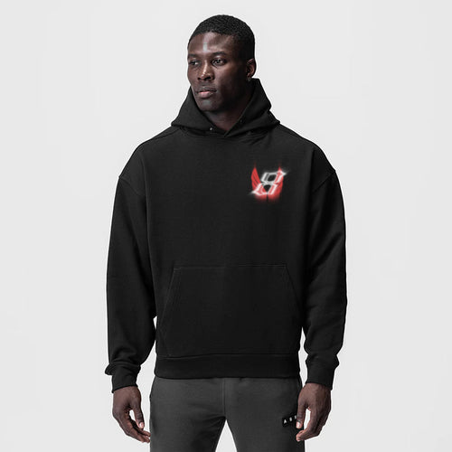 Tech-Terry Zip Pocket Hoodie in black with red logo, worn by model, front view