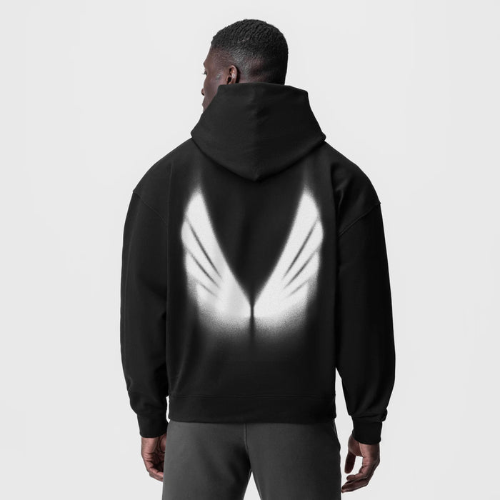 Tech-Terry Zip Pocket Hoodie in black with reflective graphic, back view on model