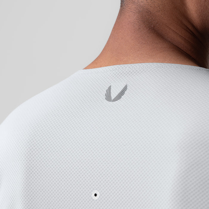 AeroSilver Training Long Sleeve in white, back view on model showing logo detail