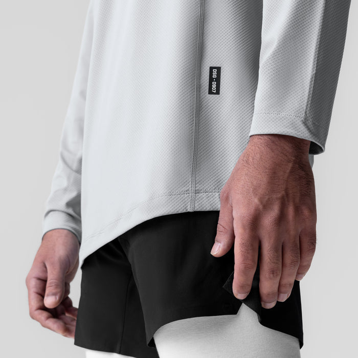AeroSilver Training Long Sleeve in white, worn by model showing fit and fabric detail