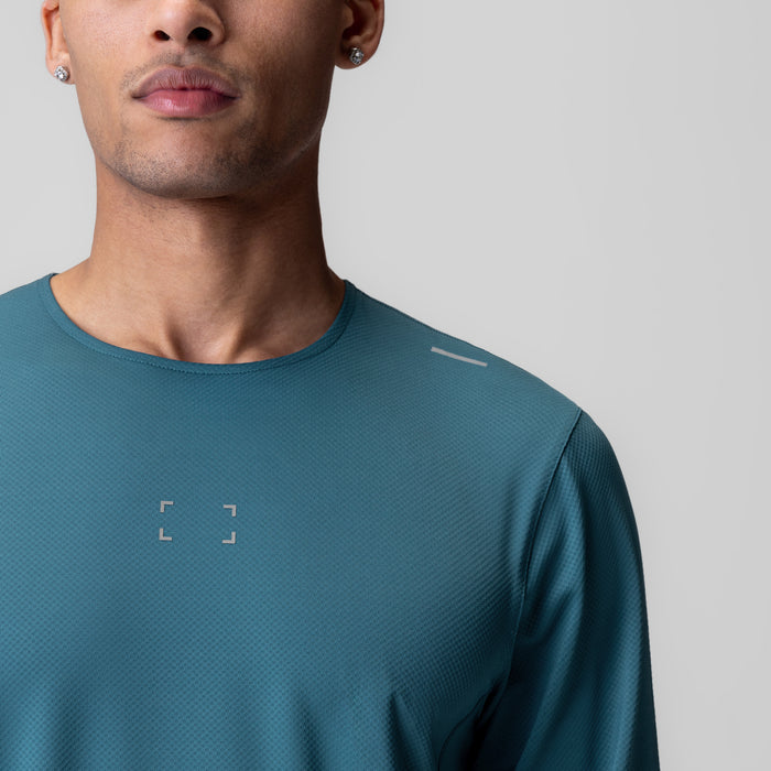 AeroSilver Training Long Sleeve in teal, worn by model, front view