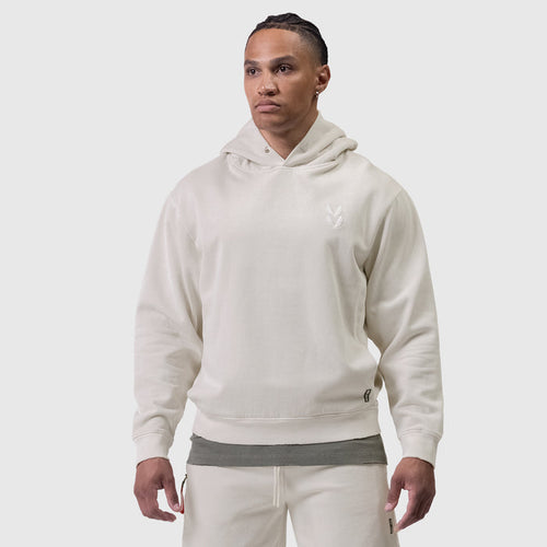Tech Essential Distressed Hoodie in Faded Stone worn by model, front view