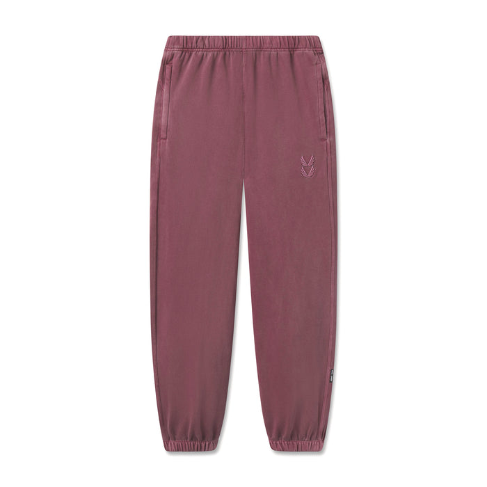 flatlay Tech Essential Sweats joggers in faded crimson, front view