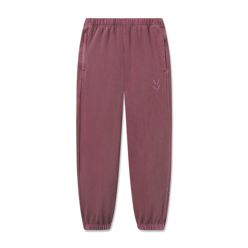 flatlay Tech Essential Sweats joggers in faded crimson, front view