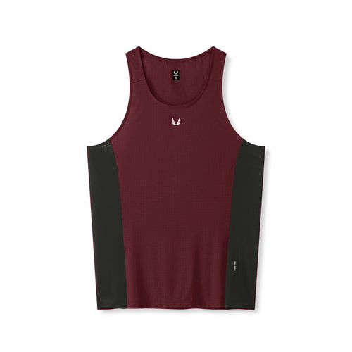 flatlay Laser-Vent Singlet Tank in crimson and black, front view