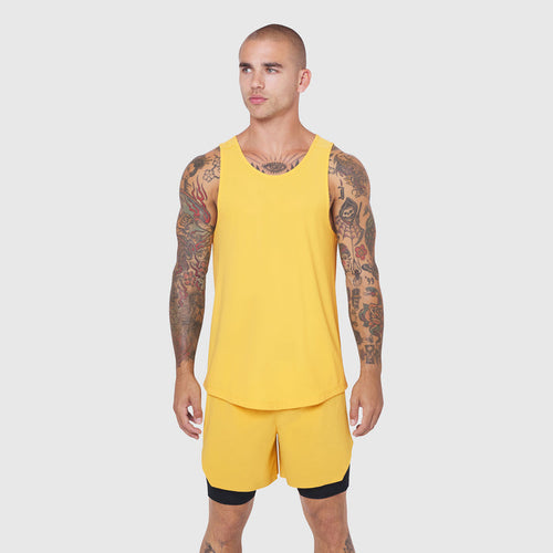 Laser-Vent Tank Top in amber yellow with matching shorts on model, front view