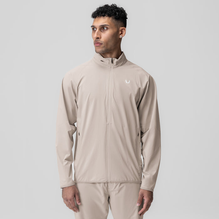 Aerotex Weather-Ready Bonded Windbreaker in chai, worn by model, front view