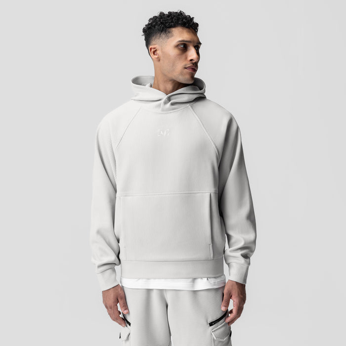 Deltapeak® Oversized Hoodie in light grey, worn by model in three-quarter view