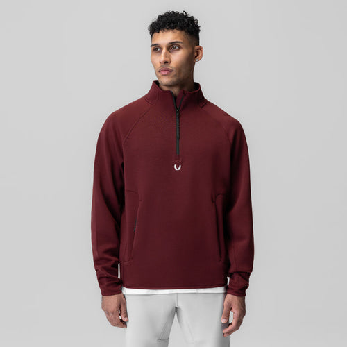 Dri-Core Quarter Zip in crimson worn by model, front view