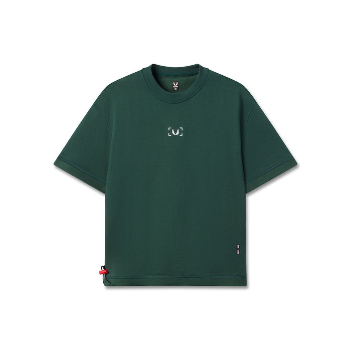 Flatlay of Herringbone Terry Oversized Cinch Tee in forest green, front view
