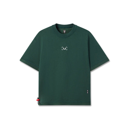 Flatlay of Herringbone Terry Oversized Cinch Tee in forest green, front view
