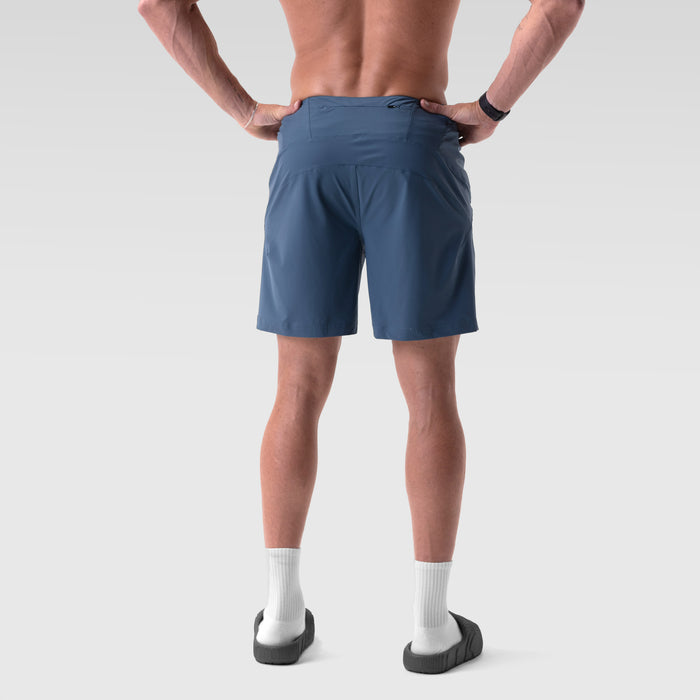 Revolutional Board Short in storm blue, rear view on model