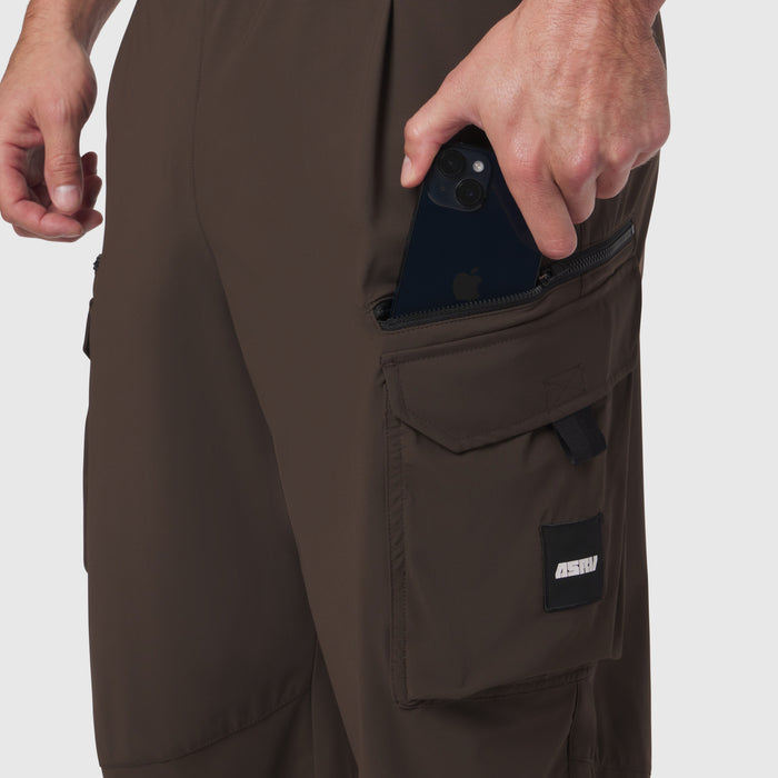 Tetra-Lite Cargo City Pant in Dark Earth worn by model, showing phone pocket detail