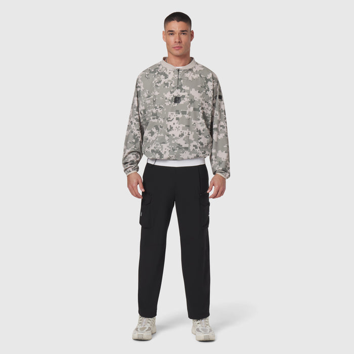 Tetra-Lite Blade Collar Zip Jacket in digital camo, worn with black cargo pants, front view