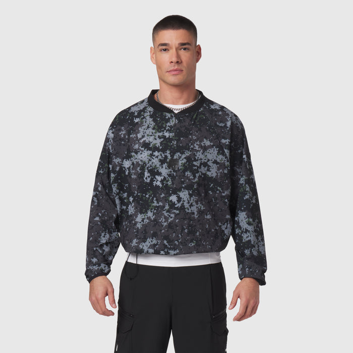 Tetra-Lite Blade Collar Zip Jacket in black pixel camo, worn by model front view