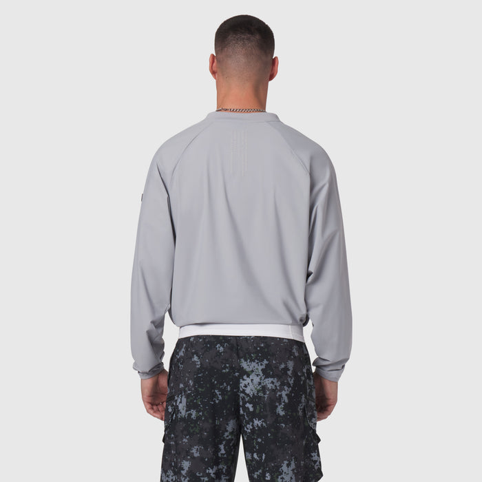 Tetra-Lite Blade Collar Zip Jacket in slate grey, worn by model from back view