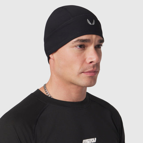 Black Lycra Skully beanie worn by model, side profile view