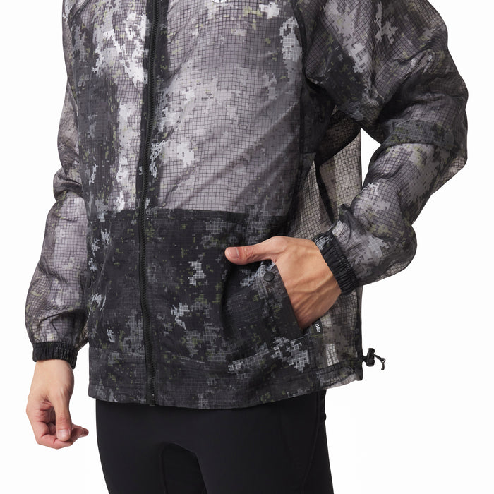 Weather-Ready Transparent Ripstop Shell Jacket in pixel camo, worn by model showing front pocket detail