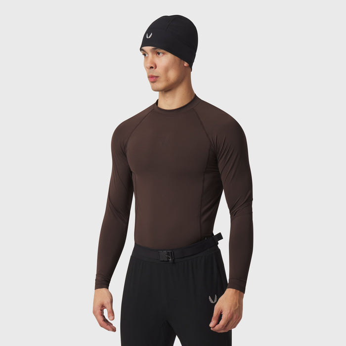 LYCRA® ADAPTIV Baselayer Longsleeve in dark earth brown, worn by model, front view
