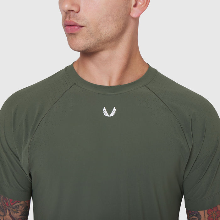 Laser-Vent™ Training Tee in olive worn by male model, front view