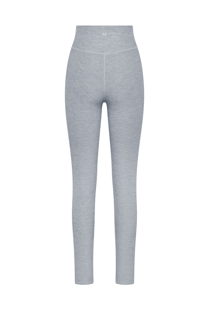 Light heather-gray high-waist leggings with center seam and 'M' size label on waistband.