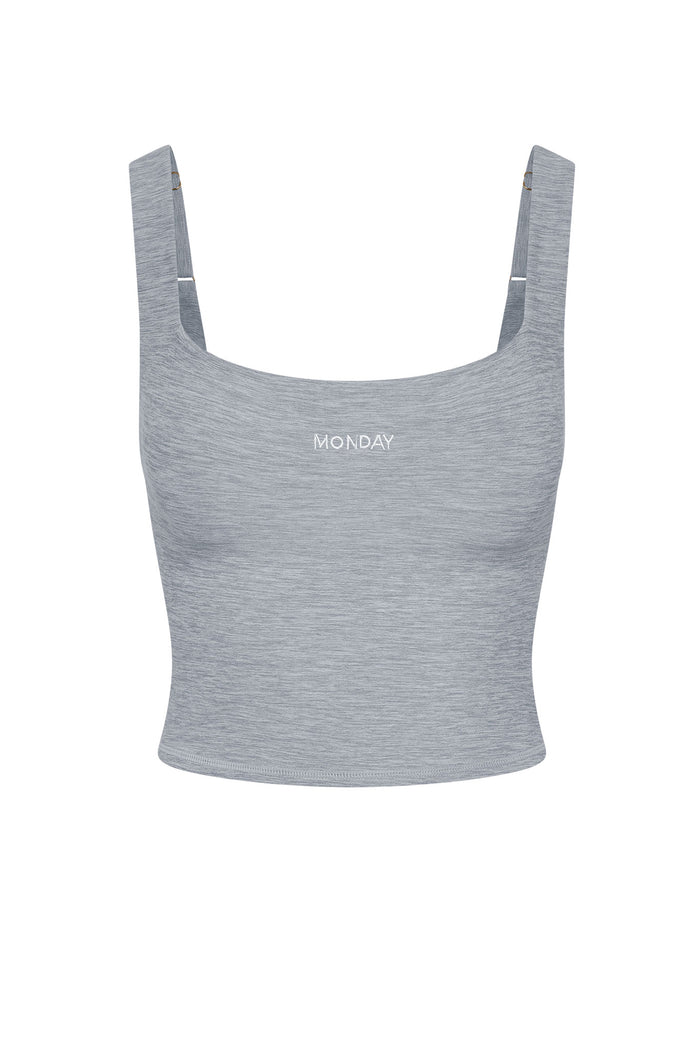 Light gray heather cropped tank top with square neckline and "MONDAY" embroidered at center chest.