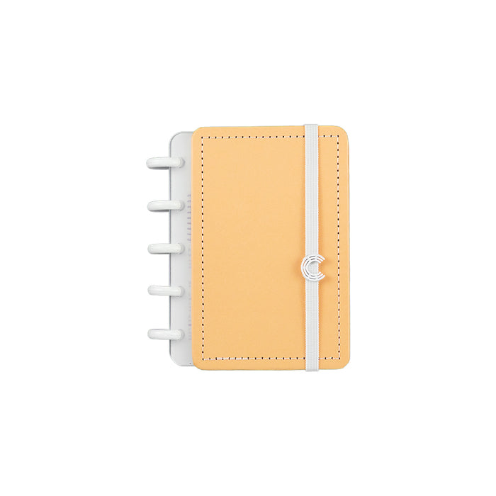 Caderno pastel laranja, tamanho inteligine.