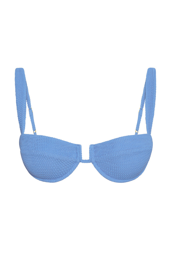 Front view of Cala Roja Top in Azure Crinkle showing balconette shape, crinkle texture, adjustable straps on white