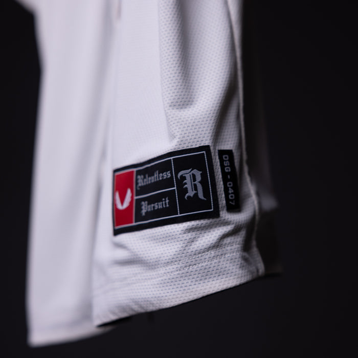 FA'21 Reversible Jersey label closeup detail shot on white fabric