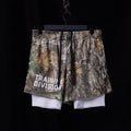 flatlay FA'23 Training Division Mesh Shorts in camo with white underlayer, front view
