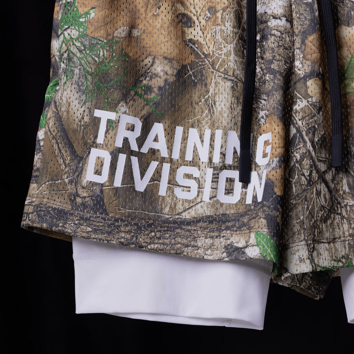 flatlay Training Division Mesh Shorts in camo with white underlay, front view