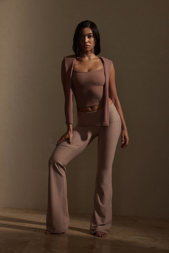Full-length front view of Melrose Flared Legging in Heather Mauve showing high-rise waistband and flared leg on model