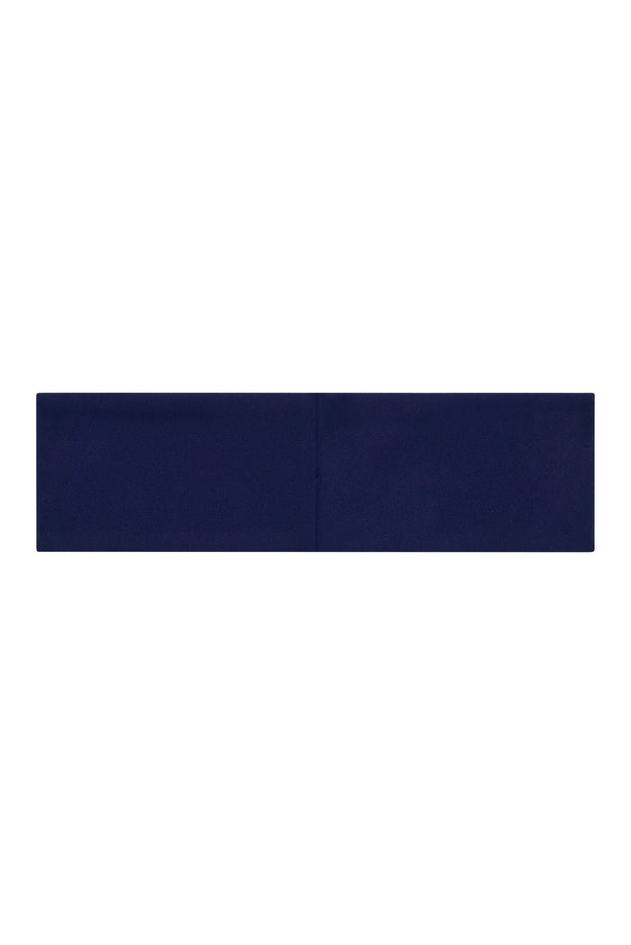 Flat lay of Monday Headband in Midnight navy showing wide fabric band with center seam on white background