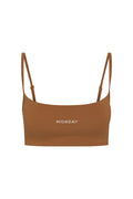 Front view of Olympic Bra in caramel showcasing scoop neckline, adjustable straps, embroidered MONDAY logo on white