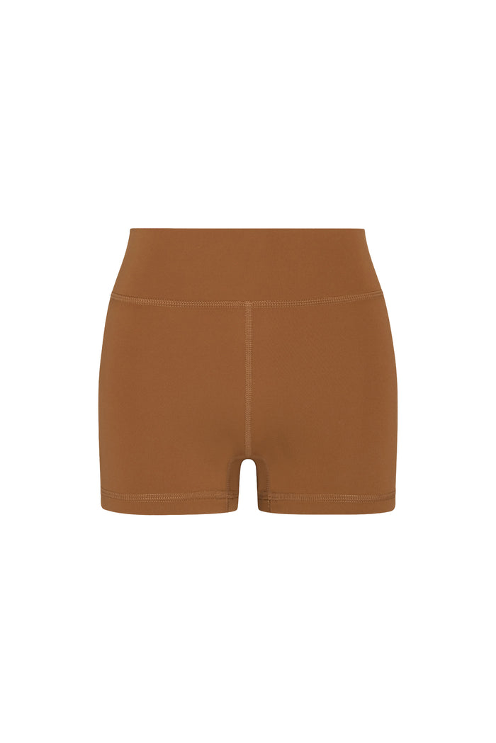 Front view of Sedona Short in Caramel showcasing doubled waistband, center front seam and short inseam on white background