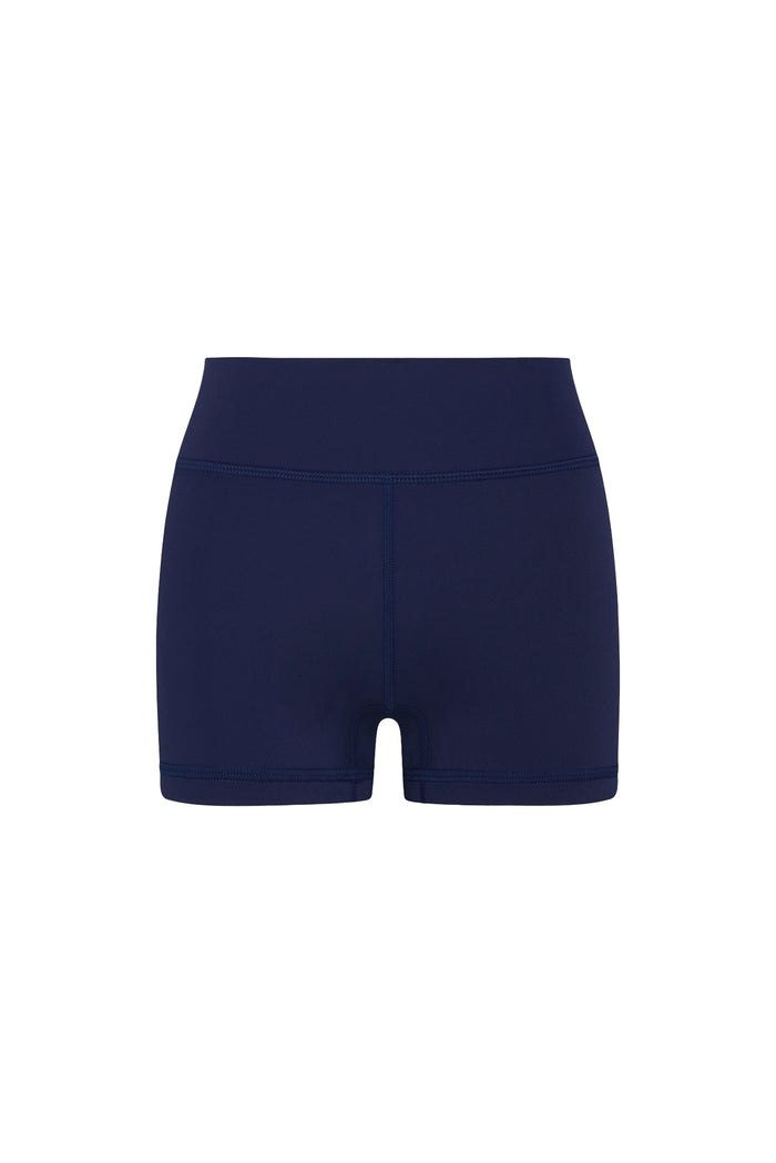 Front view of Sedona Short in Midnight showcasing low-rise doubled waistband and 3 3/8 inch inseam with neutral studio background