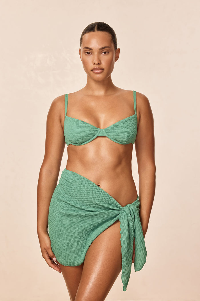 Front view of St Barth’s skirt in Pond Crinkle showing textured wrap tie and high slit on neutral background