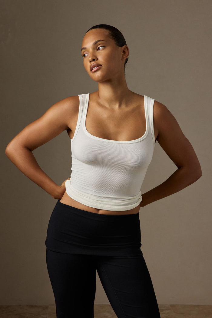 Front view of Tash Tank Long in Ivory Lightweight Rib showing wide square neckline and thin rib texture on neutral background