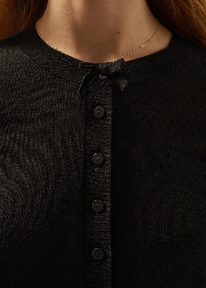 THE CURTSEY CARDIGAN