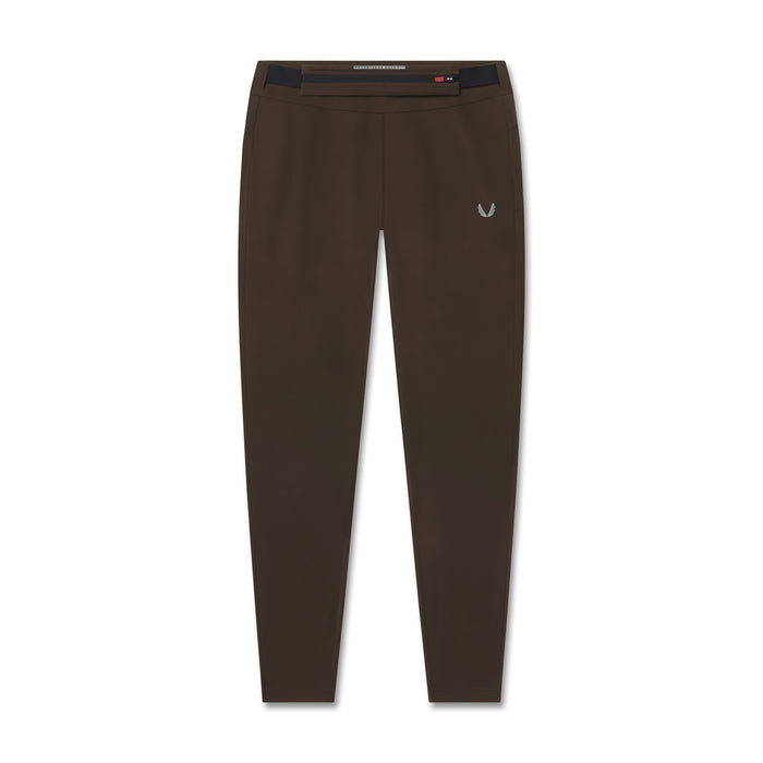 Flatlay of W059 Hybrid Belt-Pack Run Legging in Dark Earth, front view