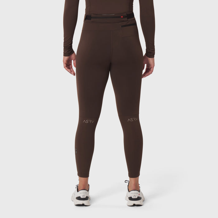 W059 Hybrid Belt-Pack Run Legging in dark earth, back view on model