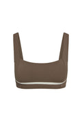 Front view of Zion Bra in stone with ivory contrast piping, square neckline and wide straps on white background