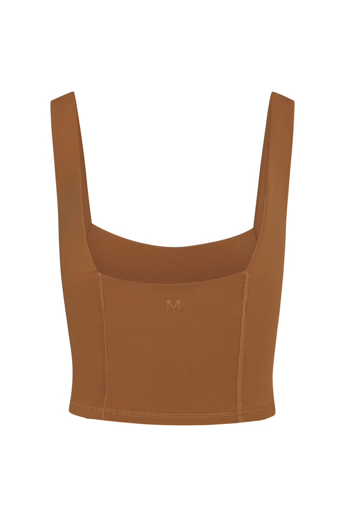 Front view of Zion Tank in caramel showing square neckline, contour seaming and cropped hem on white background