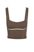 Front view of Zion Tank in stone with ivory underbust piping, square neckline and wide straps on white background