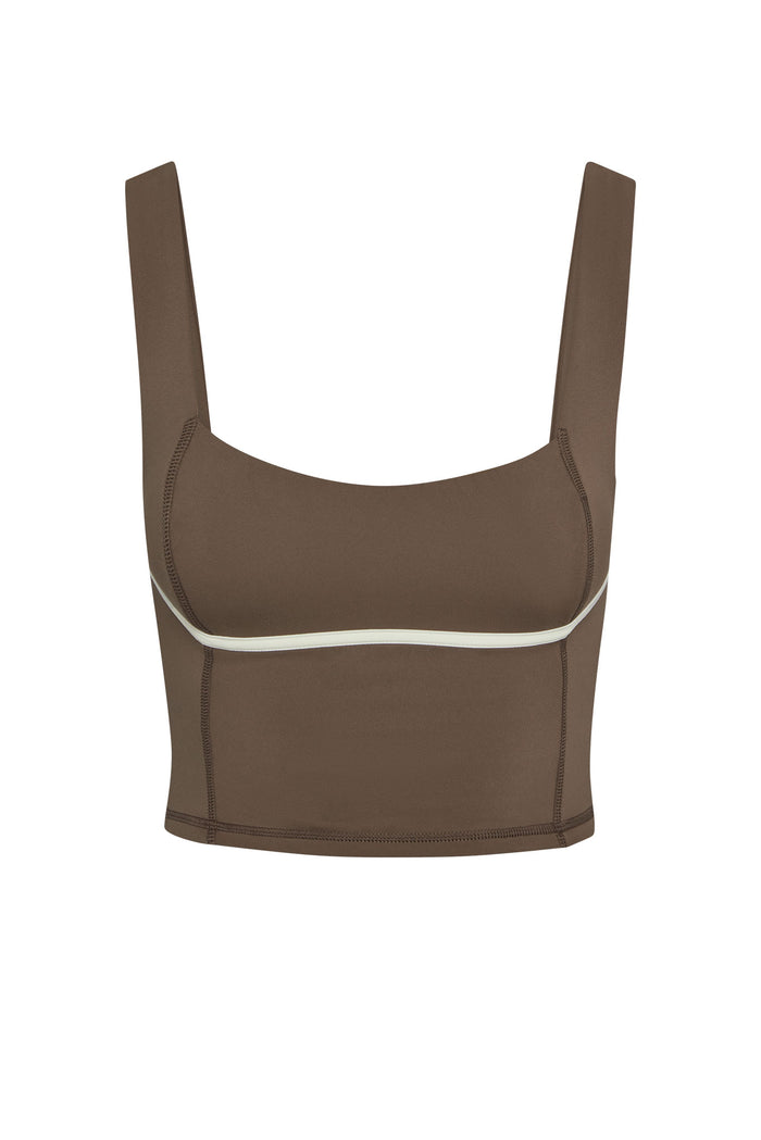 Front view of Zion Tank in stone with ivory underbust piping, square neckline and wide straps on white background